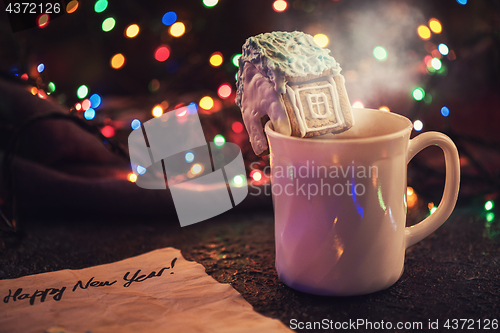 Image of Christmas cookies and cup of tea