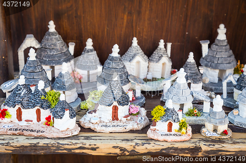 Image of ALBEROBELLO, ITALY - Trulli di Alberobello souvenirs for tourist