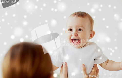 Image of happy little baby with mother