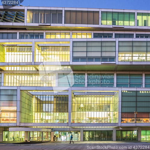 Image of Exterior of Slovenian Chamber of Commerce at dusk.