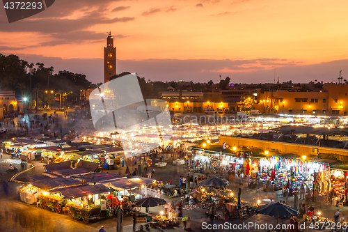 Image of Jamaa el Fna market square in sunset, Marrakesh, Morocco, north Africa.