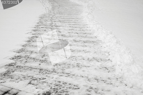 Image of Cleaned sidewalk after a snow fall