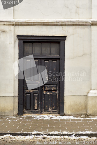 Image of Black wooden doors of old historical house