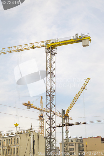 Image of construction site, building and cranes