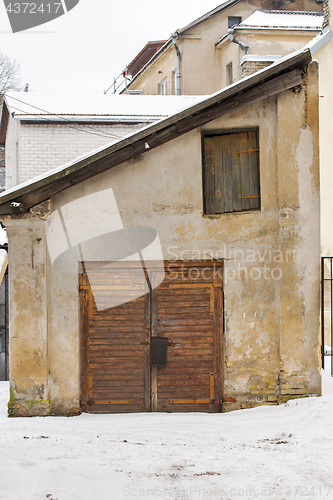 Image of wooden plank door of old house