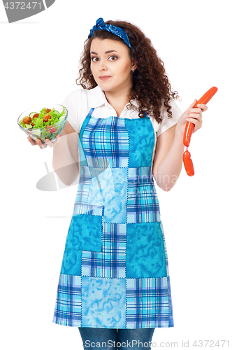 Image of Young housewife on white