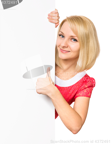 Image of Woman with blank signboard