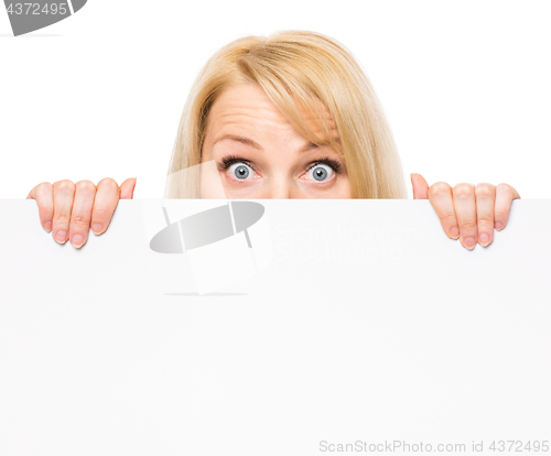 Image of Woman with blank signboard