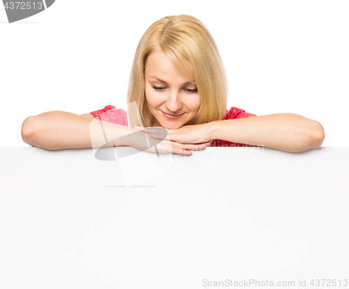 Image of Woman with blank signboard