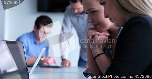 Image of Business Team At A Meeting at modern office building