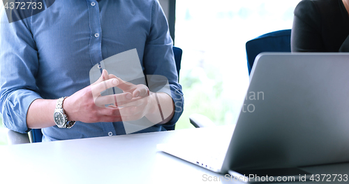 Image of young businessman in startup office