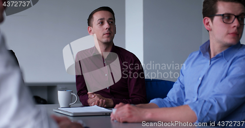 Image of Business Team At A Meeting at modern office building