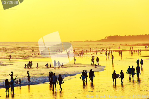 Image of Walking on the beach. Bali