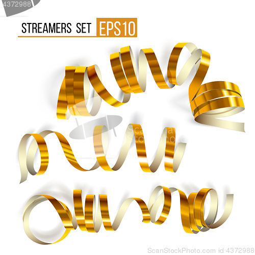 Image of Set of gold curling streamers on white