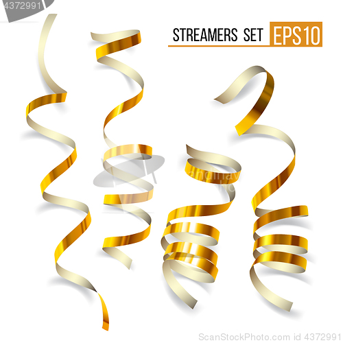 Image of Set of gold curling streamers on white