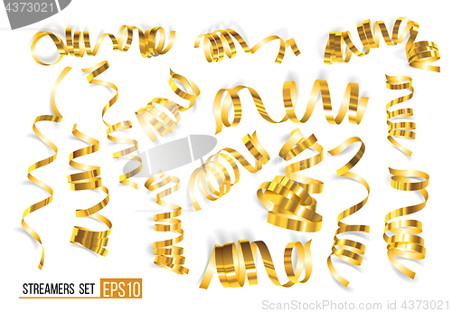 Image of Set of gold curling streamers on white
