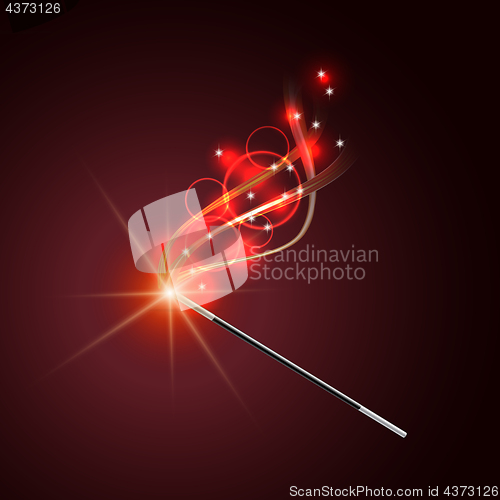 Image of Magic wand with magical red sparkle trail