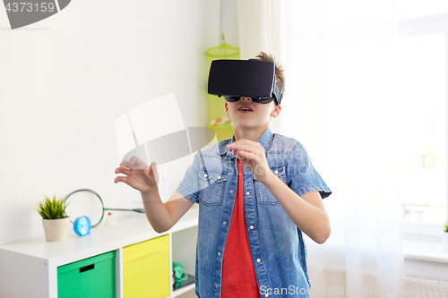 Image of boy in virtual reality headset or 3d glasses