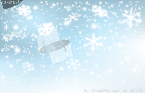 Image of Falling snow on a light blue background.