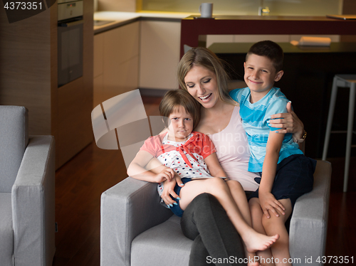 Image of Young Family Using A Tablet To Make Future Plans