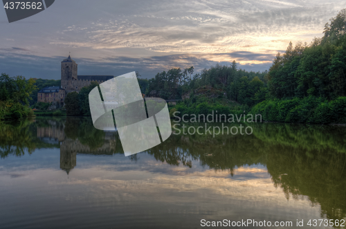 Image of Kost castle and Bily brook. Sunset. Czech Republic