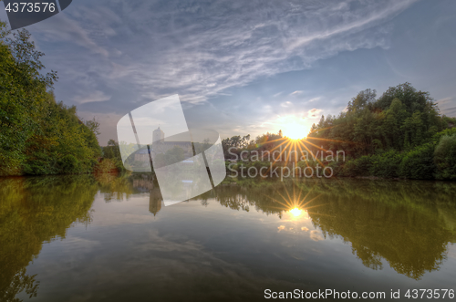 Image of Kost castle and Bily brook. Sunset. Czech Republic