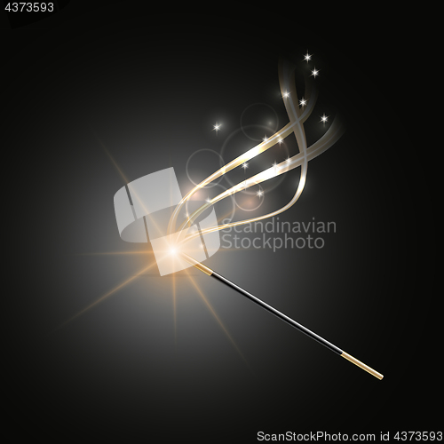 Image of Magic wand with magical gold sparkle trail