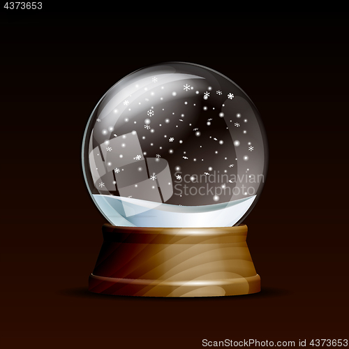 Image of Snow globe with falling snowflakes.
