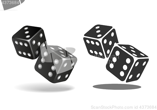 Image of Two black falling dice isolated on white.