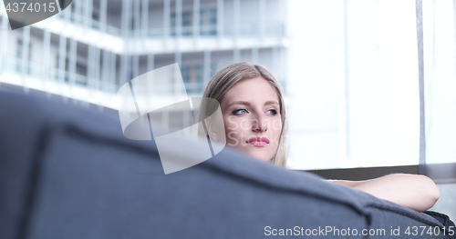 Image of woman using tablet in beautiful apartment