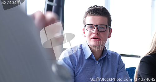 Image of Business Team At A Meeting at modern office building