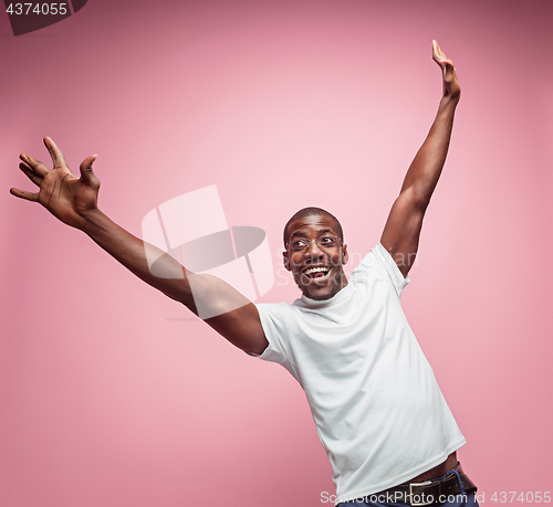 Image of Portrait of a very happy afro American man