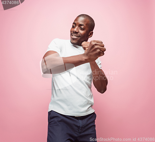 Image of Portrait of a very happy afro American man