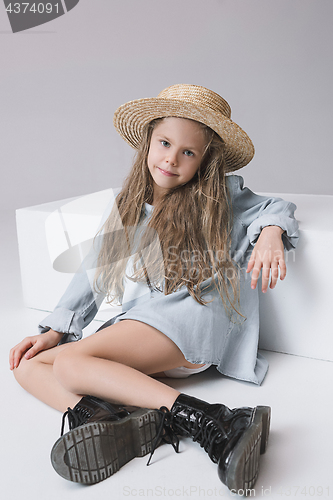 Image of Stylish young teen girl over gray background