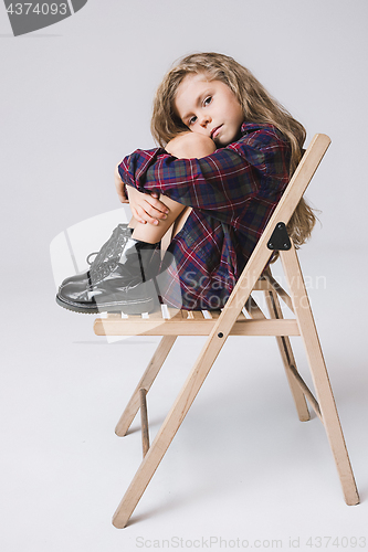 Image of Stylish young teen girl over gray background