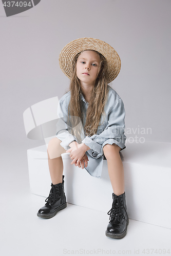 Image of Stylish young teen girl over gray background