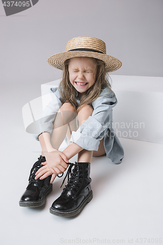 Image of Stylish young teen girl over gray background