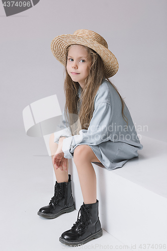 Image of Stylish young teen girl over gray background