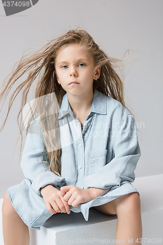 Image of Stylish young teen girl over gray background