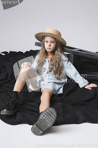Image of Stylish young teen girl over gray background