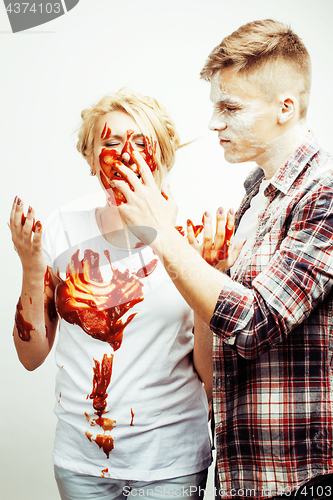 Image of young pretty couple, lifestyle people concept: girlfriend and boyfriend cooking together, having fun, making mess isolated on white background