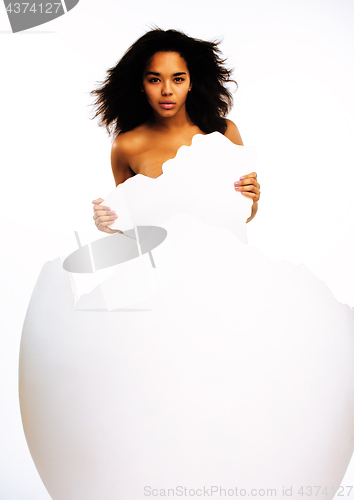 Image of black skinned woman in big crashed egg