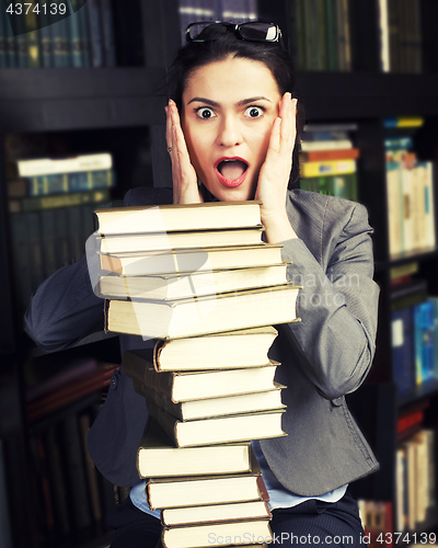 Image of stock photo portrait of beauty young woman reading book in library