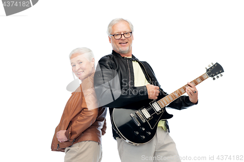 Image of happy senior couple with electric guitar