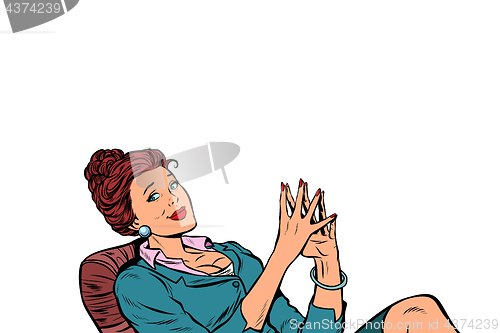 Image of businesswoman sitting at the table relaxed