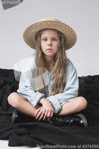 Image of Stylish young teen girl over gray background