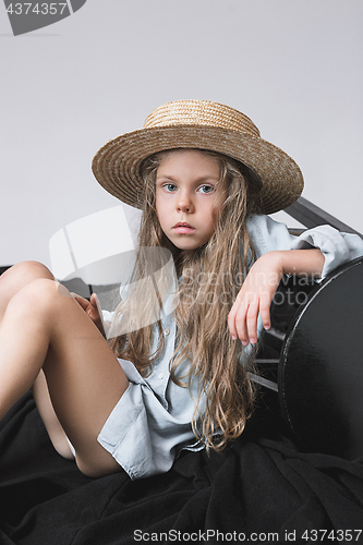 Image of Stylish young teen girl over gray background