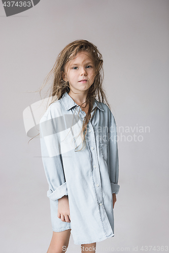Image of Stylish young teen girl over gray background