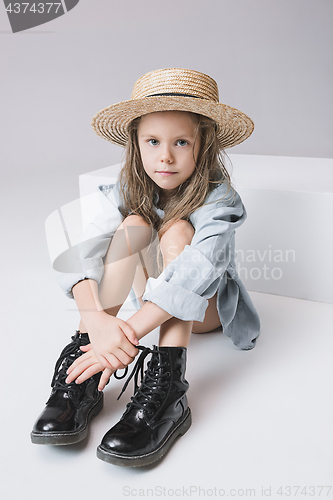 Image of Stylish young teen girl over gray background