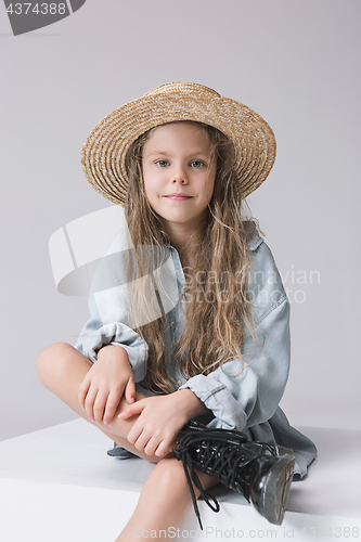 Image of Stylish young teen girl over gray background